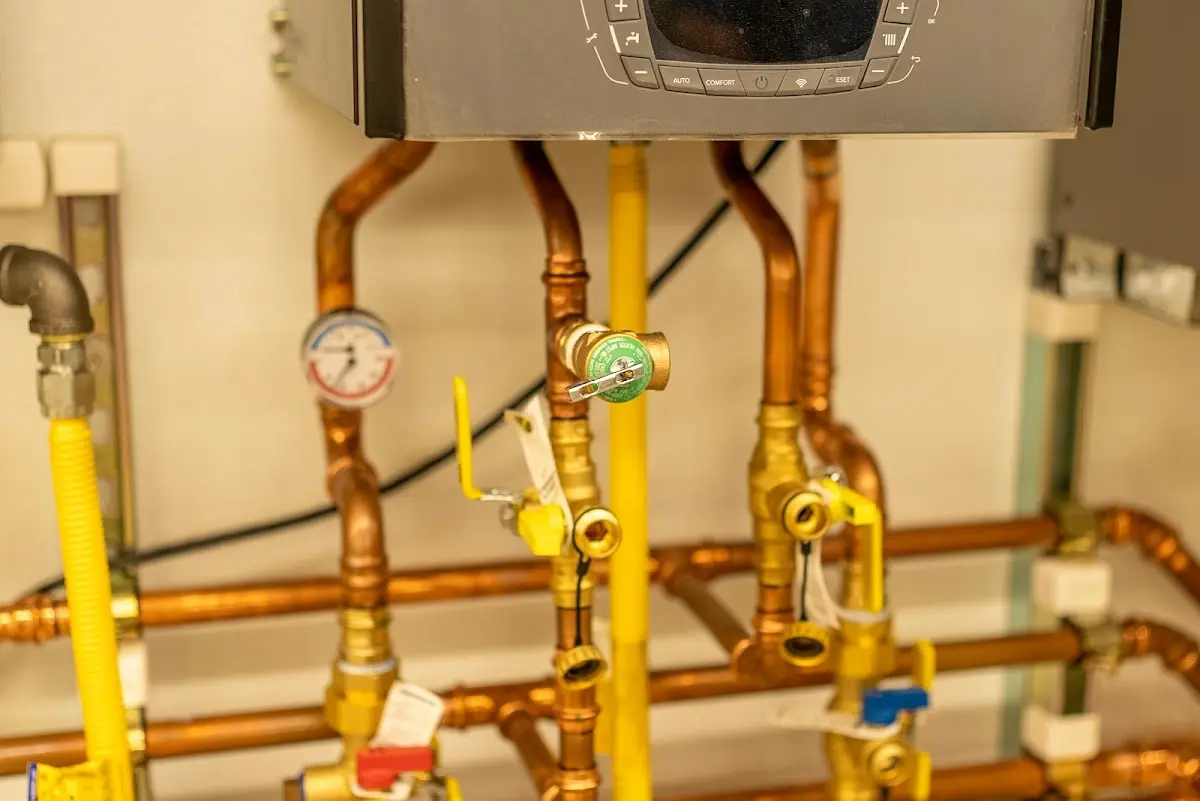 Licensed technician providing Sewer Cleanout for a homeowner in West Liberty